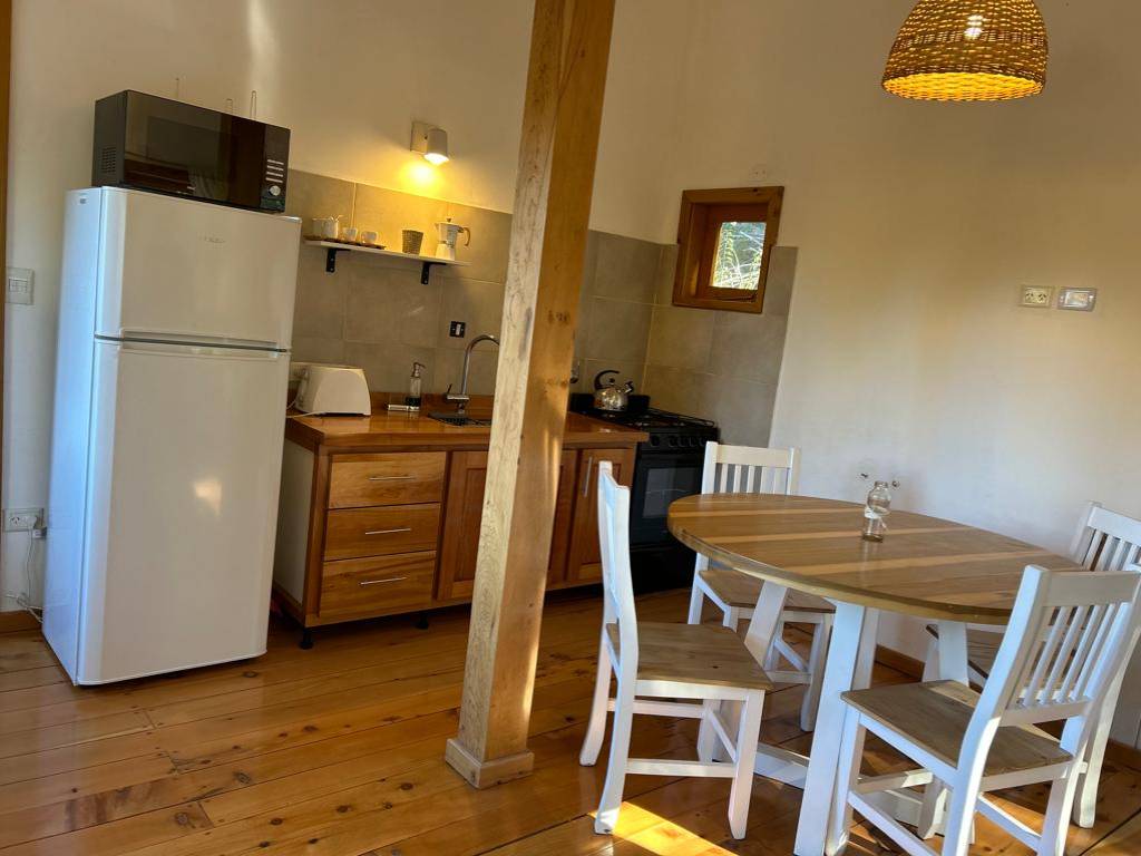 Kitchen and dining area with round table