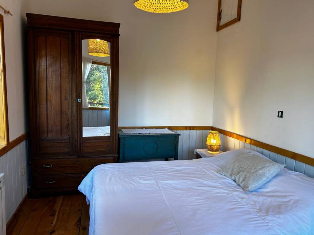 Bedroom with antique wardrobe