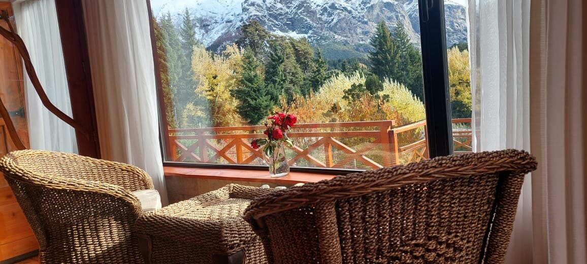 Armchairs facing the picture window