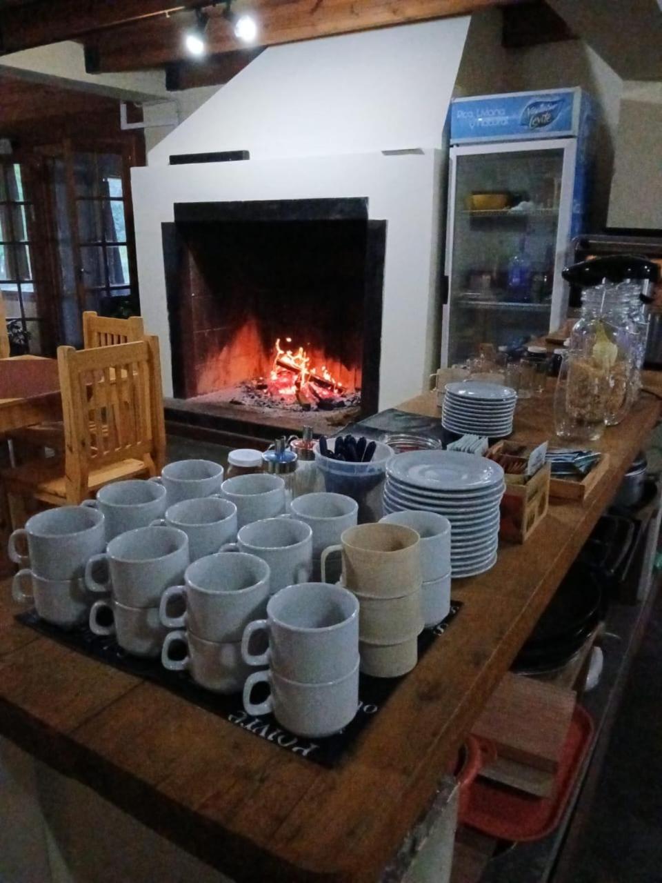 By the fireplace
